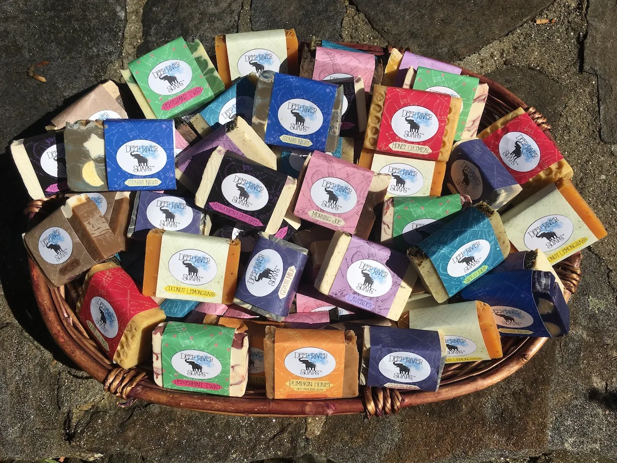 A basket filled with wrapped Deep River soap bars